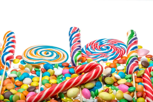 Işık Arka Planında Izole Edilmiş Renkli Şekerler Lolipoplar — Stok fotoğraf