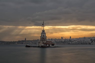 Istanbul, Turkey-July 27, 2019: illuminated Maiden's Tower at the sunset