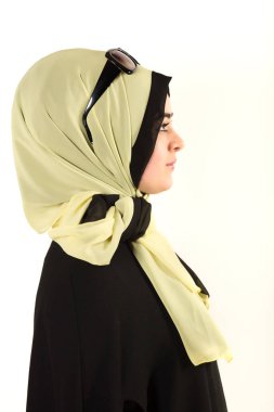 beautiful Muslim woman in a summer hijab with sunglasses