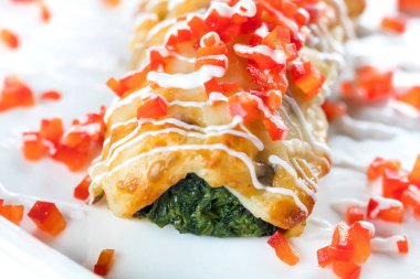 close up view of delicious spinach roll