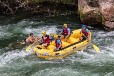 Rize, Turkey - July 24,2015 :Tourists who rafting on the river storm(Firtina Deresi) Rize, Turkey. Photo taken from Rize City, Turkey.