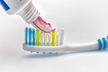 toothbrush with toothpaste, dental tools isolated on white background, dental healthcare concept 