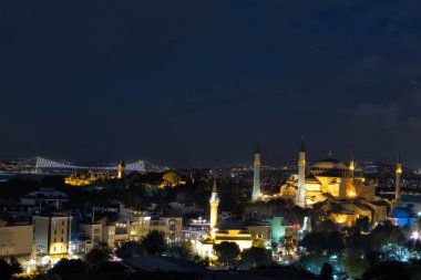 The cityscape with illuminated Hagia Sophia mosque  