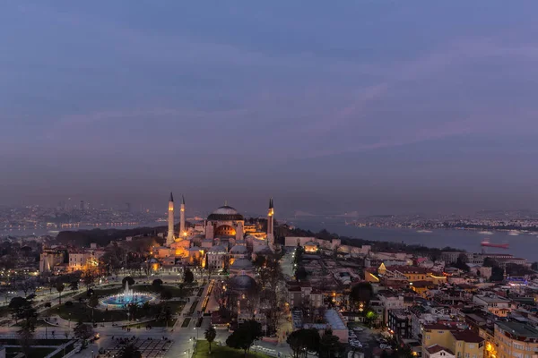 The cityscape with illuminated Hagia Sophia mosque  