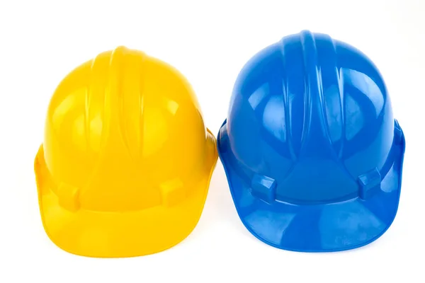 Yellow Blue Hard Safety Helmet Hat Safety Project Workman Engineer Royalty Free Stock Images
