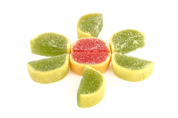 fruit flavored jelly candies slices on white background