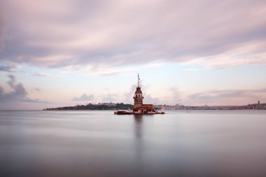 the maiden's tower in the sea in the background of the Bosphorus