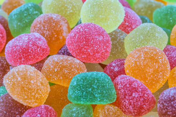 fruit flavored jelly candies on white background