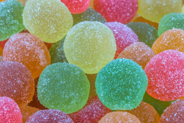 fruit flavored jelly candies on white background