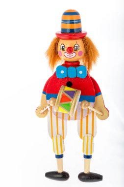 a clown in a hat and a wig on a white background