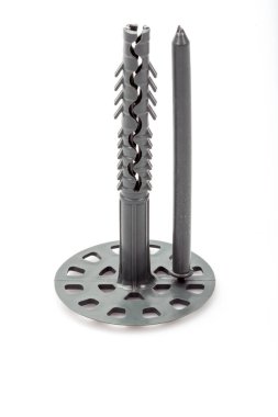 Dowels, plastik panel beyaz arka planda izole edildi. Yaklaş..