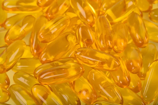 Yellow Fish Oil Capsules White Background — Zdjęcie stockowe