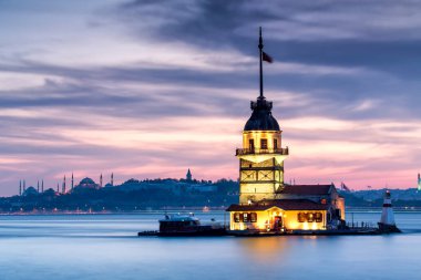Istanbul, Turkey-July 27, 2019: illuminated Maiden's Tower at the sunset