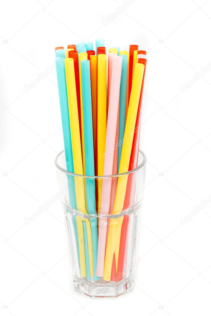 Straws in glass on white background. Close up to plenty colorful straws background, ban plastic straws for save environment concept