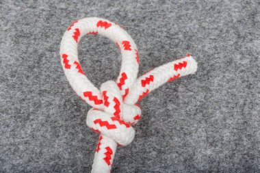knot on a grey background