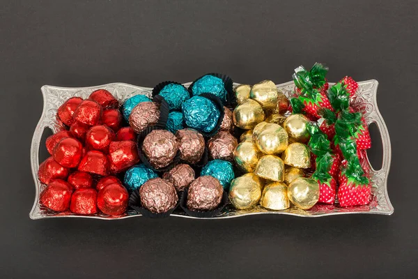 Foil Covered Gift Chocolates Candies Plate Stock Image