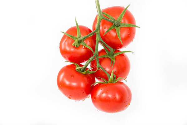 fresh ripe red tomatoes isolated on white background