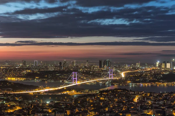 Bosporus Bridge at evening with lights. Panorama of Istanbul and Bosphorus bridge at night, Istanbul, Turkey