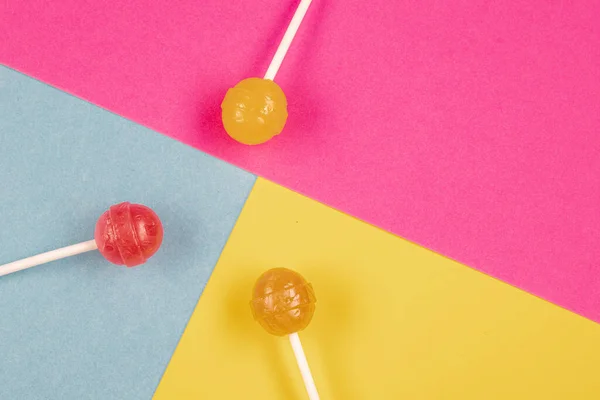 Lollipop Candies Row Colored Backgrounds Top View One Lollipop Center — Stock Photo, Image