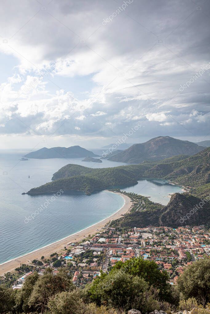 Oludeniz is a resort village on the southwest coast of Turkey. Its known for the blue lagoon of Oludeniz Tabiat Park and the wide, white Belcekiz Beach.