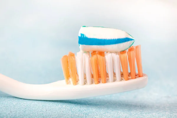 Toothbrush Toothpaste Blue Wooden Background — Stock Photo, Image