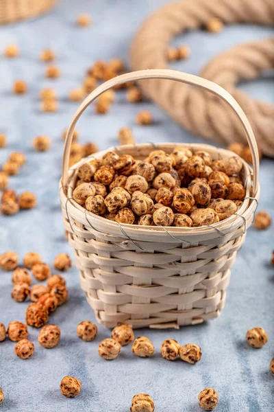 Healthy and tasty roasted chickpeas (Leblebi) snack with different spices. .sesame seeds, honey and sugar coated roasted chickpea.