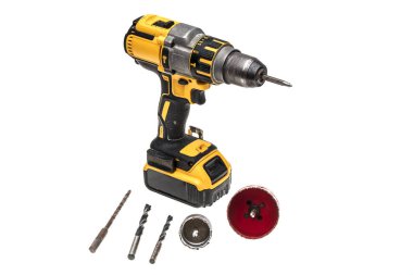 yellow drill machine on the white background