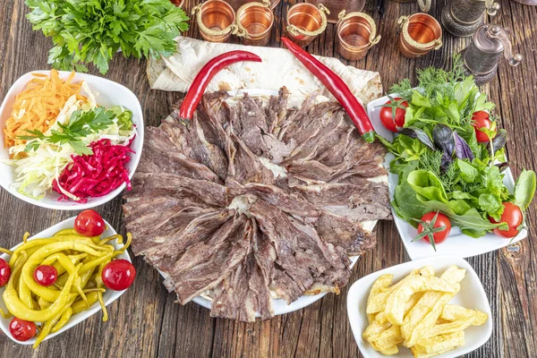 Turkish Doner Kebab on plate.  Protein nutrition, clean eating, diet concept. Turkish style doner kebab food restaurant.