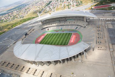 İstanbul, Türkiye - 10 Haziran 2013; İstanbul Olimpiyat Stadyumu 'nun (Atatürk Olimpiyat Stadyumu) havadan görünüşü. Helikopterden ateş ediliyor..