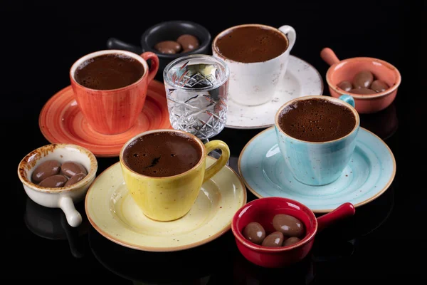 Traditional Turkish Coffee. Turkish coffee cup set isolated on black background.