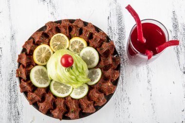 Cig kofte, Türk ve Ermeni mutfağında çiğ et yemeği. Türk sigarasının anlamı 