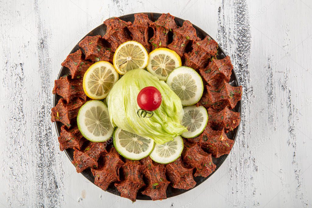 Cig kofte, a raw meat dish in Turkish and Armenian cuisines. Turkish cig means 