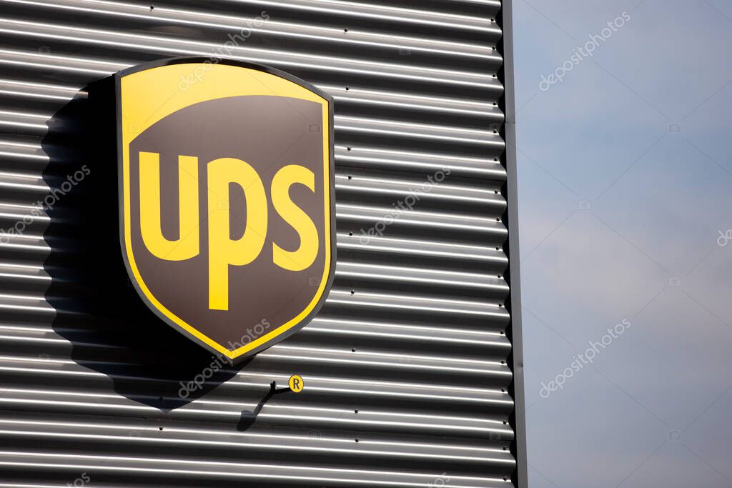 Vilnius/Lithuania March 15, 2019 UPS logo on a facade. United Parcel Service is the world's largest package delivery company and a provider of supply chain management solutions