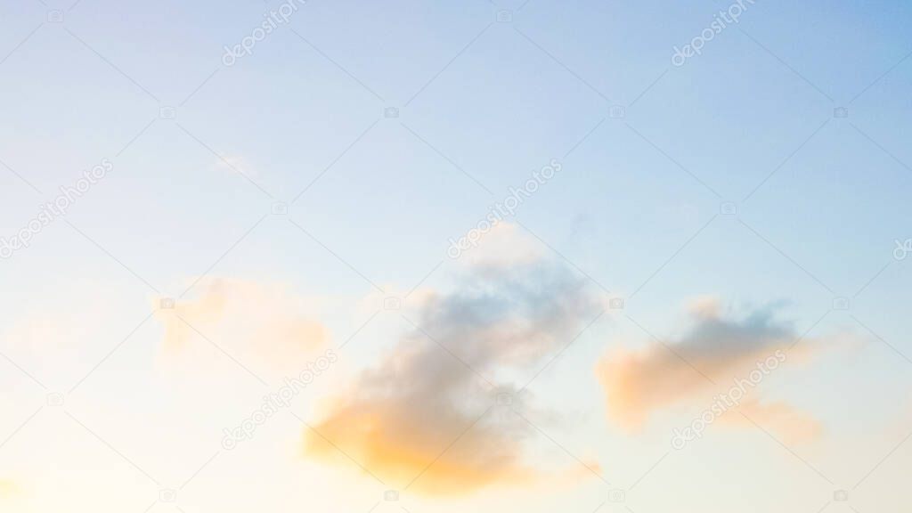 Beautiful cloudscape orange clouds on blue sky from sunlight in sunset time with space background.