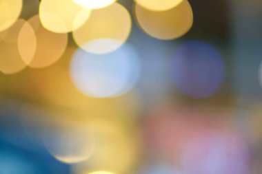 Renkli parlak bokeh ışıklı mercek bulanık arkaplan üzerinde parlaklığı ve tasarım alanı .