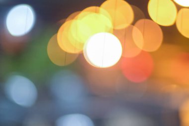 Renkli parlak bokeh ışıklı mercek bulanık arkaplan üzerinde parlaklığı ve tasarım alanı .