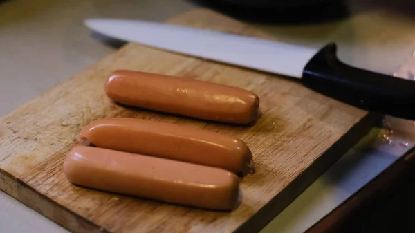 Selective Focus Fresh Boiled Sausages Wooden Cutting Board Knife Background — Stock Photo, Image