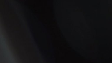 Optik mercek patlaması, ışık sızıntısı, ışık sızıntısı, doğal lamba ışığı efekti, Light Horizon, ışık titreşimleri ve parıltı, karanlık arka planda güzel bir ışık sızıntısı, gerçek mercek parlaması gürültü ve tahıl ile.