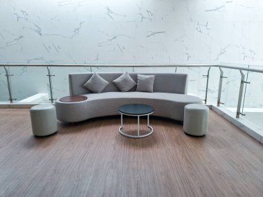 Modern Curved Sofa with Round Table and Stools at Jusuf Kalla Library. Depok, Indonesia - 06 09 2025