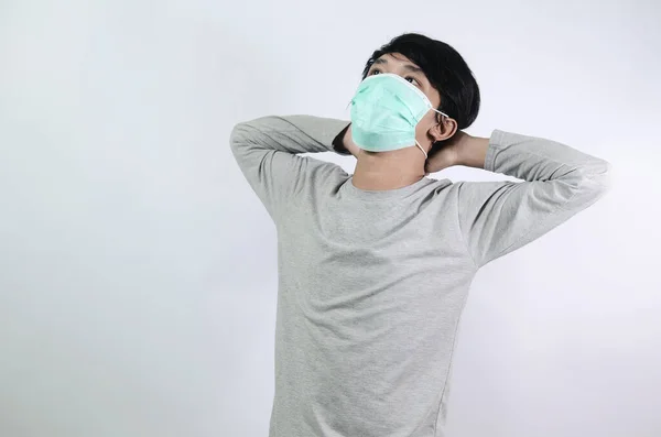 Asiat Uvolněným Výrazem Asijský Muž Šedém Tričku Nosí Lékařskou Masku — Stock fotografie