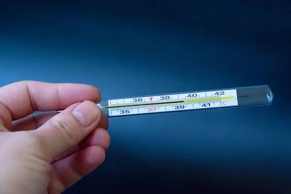 Woman Holds Thermometer High Temperature Her Hand — Stock Photo, Image