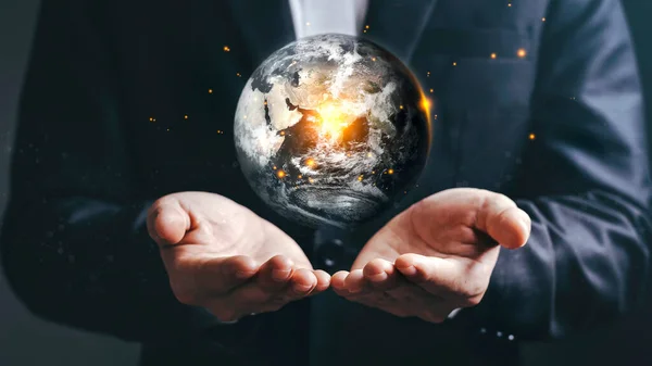 Asyalı İşadamları ve Dünya Günü 'nün Küresel Isınma Aralığında Enerji Tasarruf ve Çevre Kaynakları Koruma Konseptine sahip Küresel İşadamları, NASA tarafından desteklenen bu görüntünün elementleri