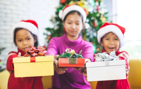 Asian Children Holding Beautiful Gift Boxes Giving Christmas Celebration — Stock Photo, Image