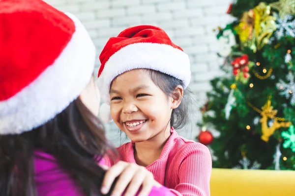 Cute Asian Child Girl Hugging Her Mother Love Christmas Celebration — Stock Photo, Image
