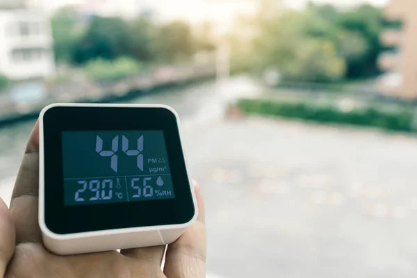 air quality monitoring device at building balcony