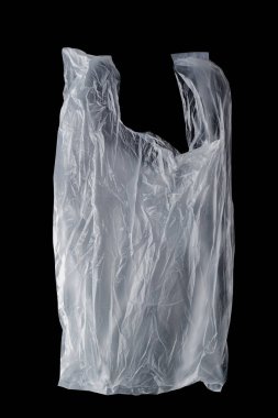 crumpled single-use plastic bag on black background, polyethylene plastic, green environment concept clipart