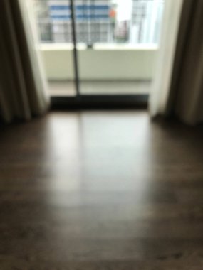 Soyut bulanıklaştırma ve odaklanmış lamine zemin ve arka plan için yüksek katlı apartman dairesinin balkonu