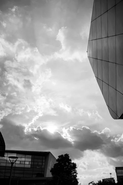 sunny sky for background, cloudscape photography taken in modern building area, black and white photography