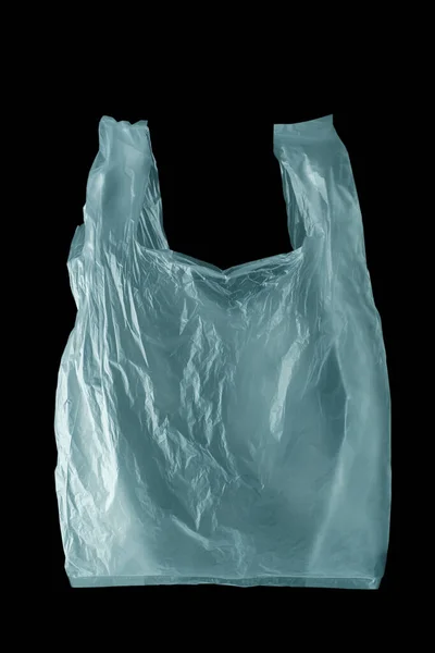 Siyah zemin üzerinde tek kullanımlık plastik torba, polietilen plastik, yeşil çevre konsepti