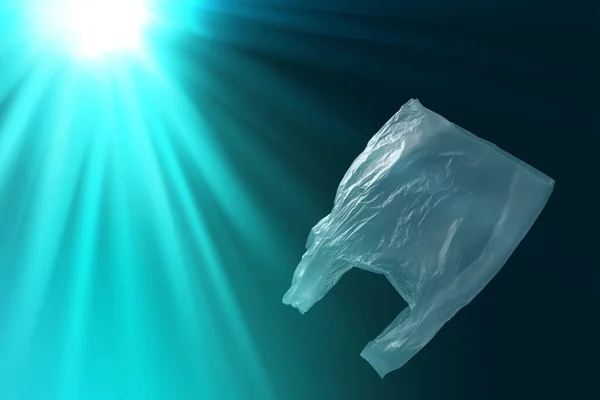 Tek kullanımlık plastik poşetlerin denizlerde veya okyanuslarda yüzen yaratıcı arka planı, çoğu plastik torba çöplükte ya da okyanusta, polietilen plastik, kirlilik konsepti, çevre kirliliği